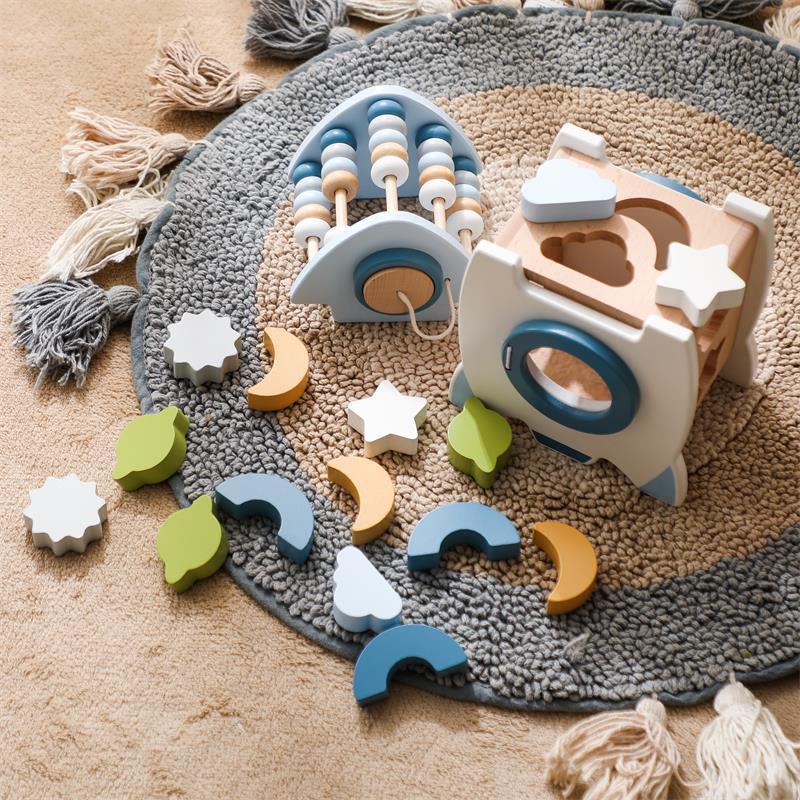 The Moka Baby™ Wooden Rocket Shapes Sorter