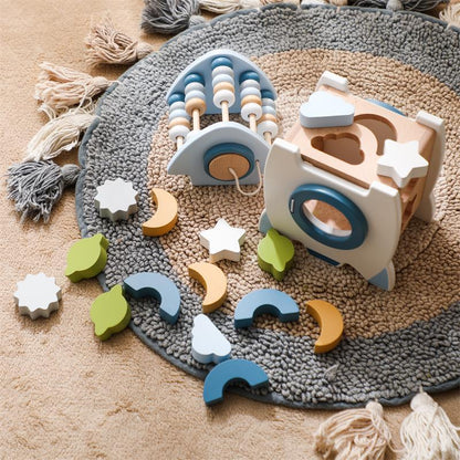 The Moka Baby™ Wooden Rocket Shapes Sorter